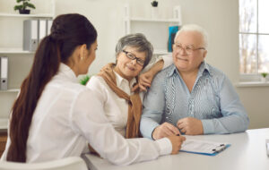 Couple consulting with dementia care navigator