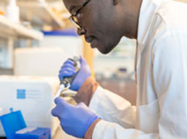 Student conducting scientific experiment in lab