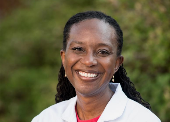 Dr. Allison in her white coat