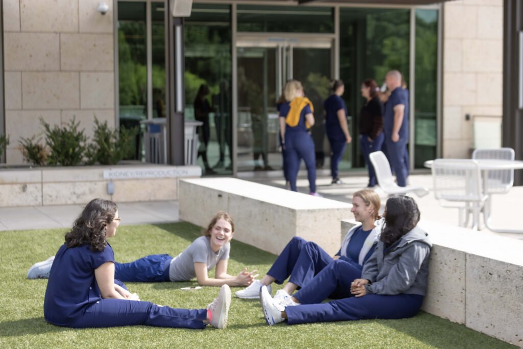 UNT Health students sitting on the lawn together