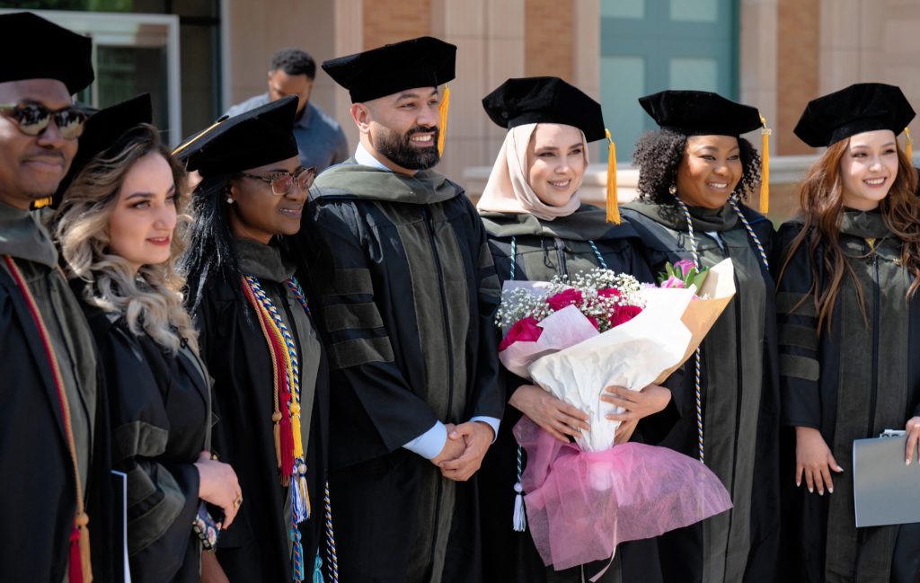 Group of graduates posing for a photo